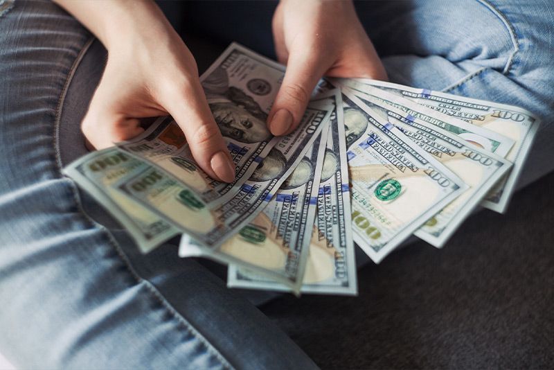 man counting his money